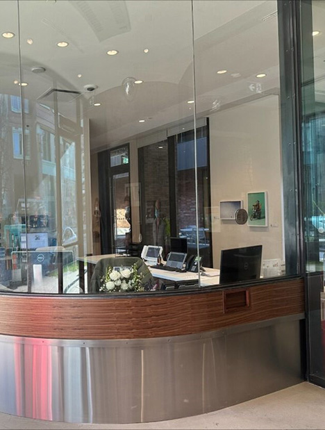 reception_desk the new reception desk at Casey House. Rounded with a reflective bottom.